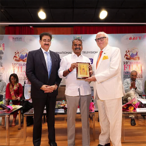 Cdr. K. L. Ganju Presented with Festival Memento by Dr. L. Murugan at 19th Global Film Festival Noida 814585087_1630372868614295_7847284703033350553_n