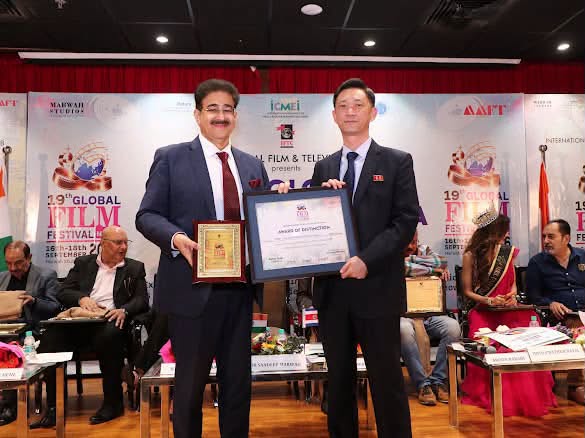 DPR Korea Diplomat Choe Ju Nam Receives Festival Memento and Award of Distinction at 19th Global Film Festival Noida 2026 825279723_2151531502404765_8220114744771992501_n